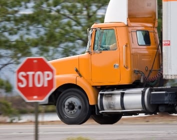 Truck runs stop sign crop and resize