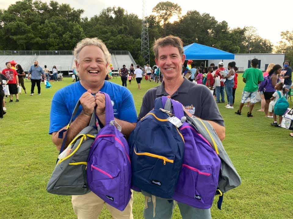 andy and michael at the backpack giveaway