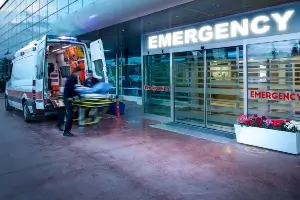 EMT crew unloading a patient at the ER 